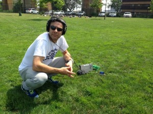 Stephen Dubner recording at an ultimate frisbee game.