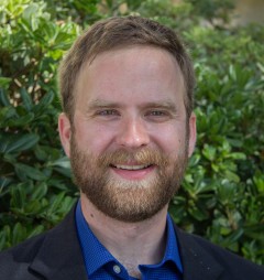 Ph.D candidate Matthew Gibson found that the further west you live in a timezone, the less you make. (Photo: Jamie Mullins)