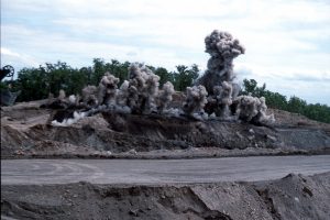 Blasting in an open cut mine